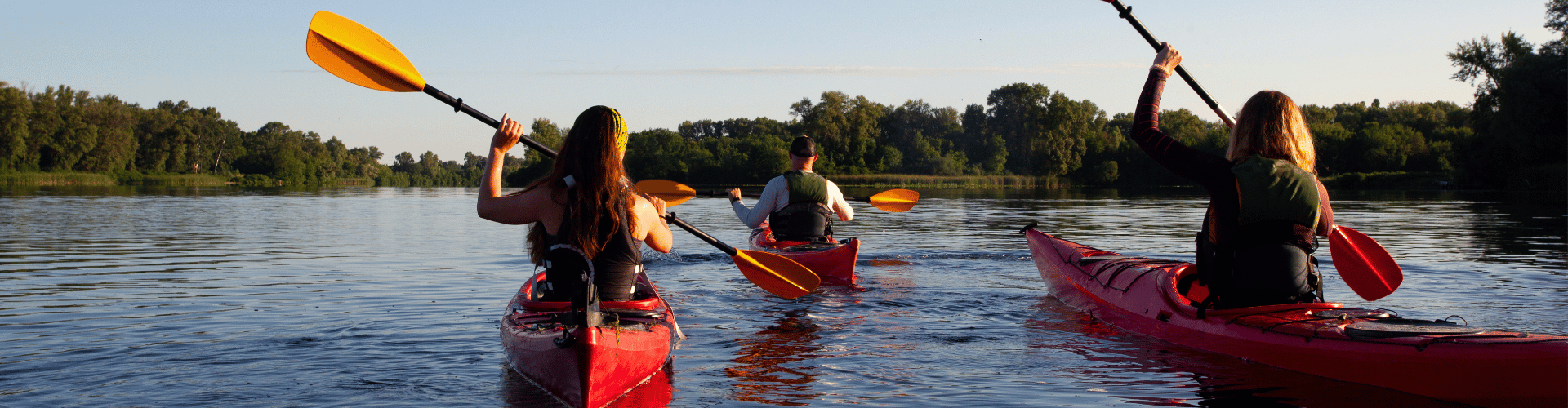 Wanaque Banner Three friends kayaking in Wanaque, NJ.